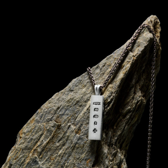 Solid Silver Handmade Millennium Ingot Pendant. solid Sterling Silver Ingot pendant has a full set of London hallmarks, featuring the Millennium Mark 2000