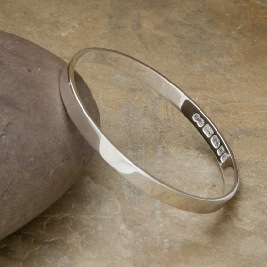 Zennor Solid Silver Bangle handmade in Cornwall. Solid Silver bracelet with display London Hallmarks - 6mm wide.